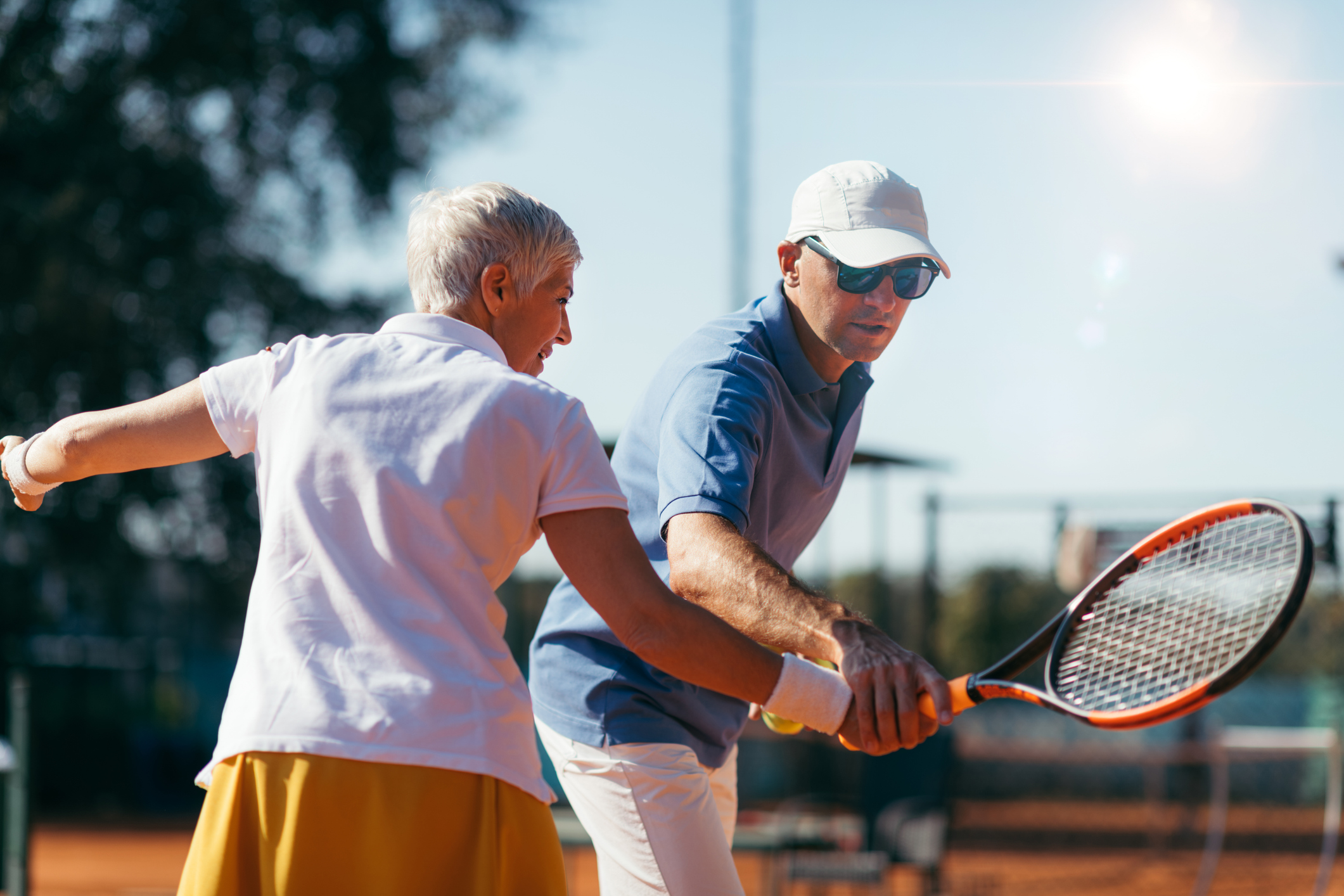 Beautiful Mature Active Woman Playing Tennis